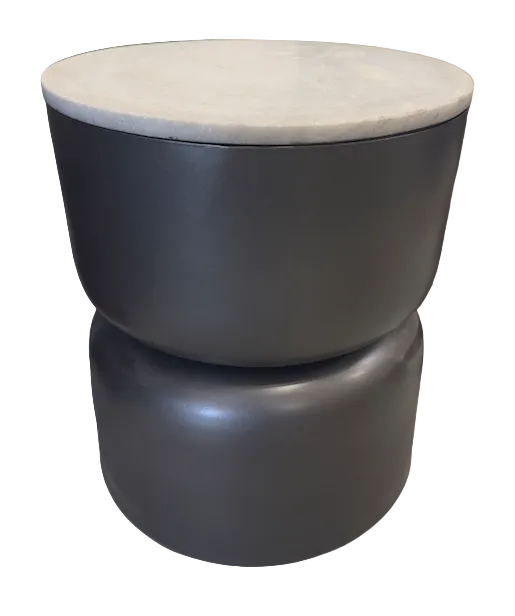 Two-tiered cylindrical stool with a light-colored top and dark base on a floor.